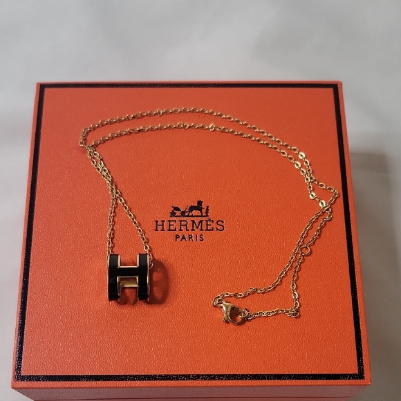 Hermes Jewelry - Hermes Gold Necklace with Black Pendant
